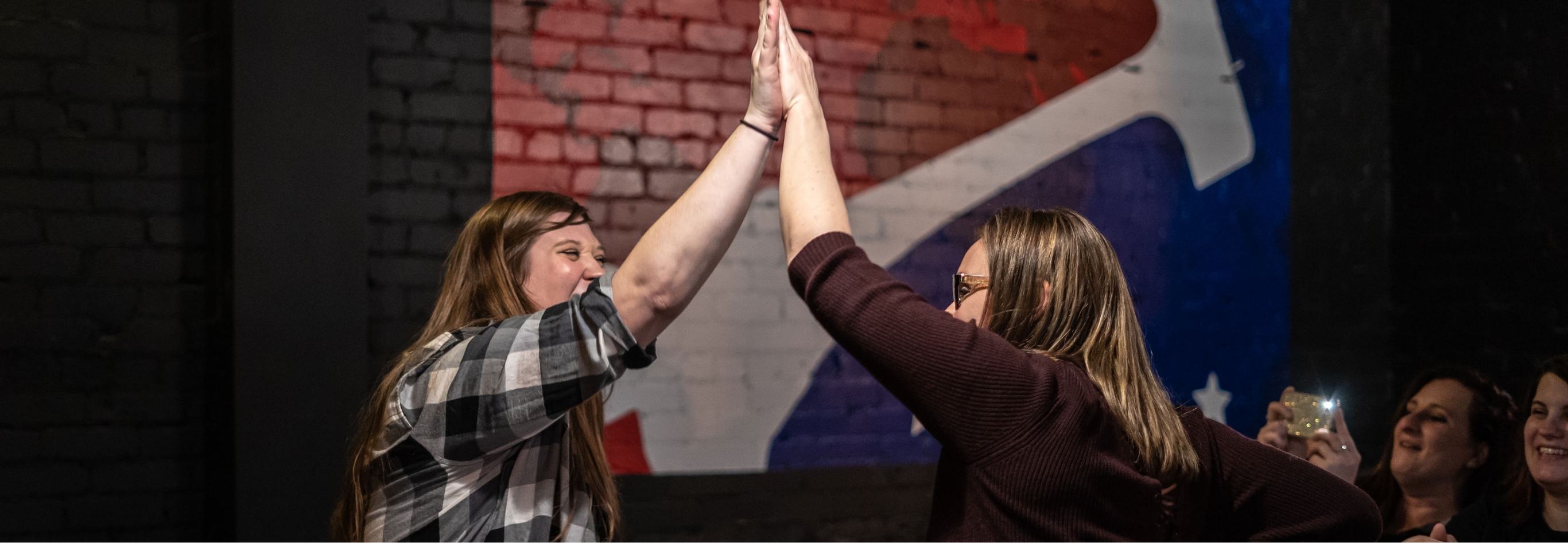 Team celebrating at Bad Axe Throwing
