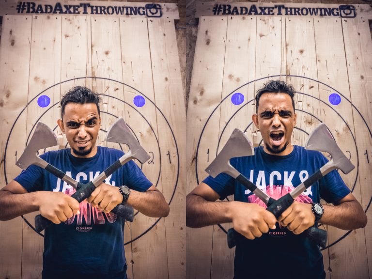 Guy holding two axes at Bad Axe Throwing Montreal