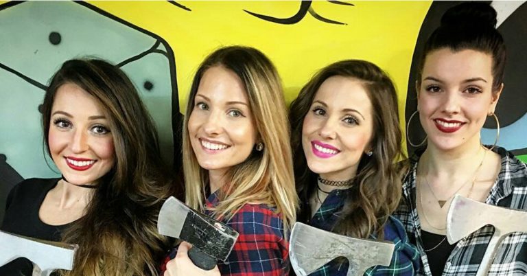 Girls holding axes at Bad Axe